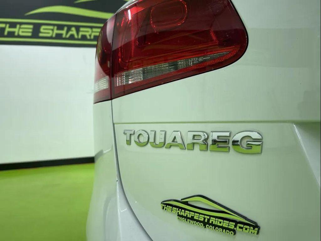used 2012 Volkswagen Touareg Hybrid car, priced at $10,988