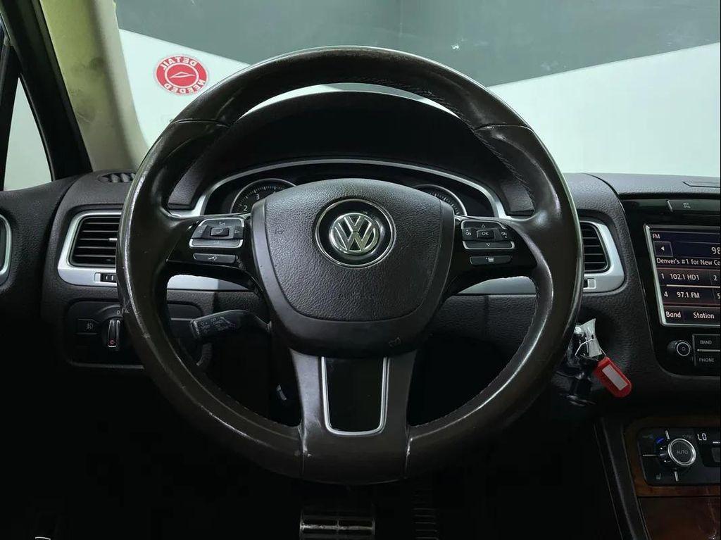 used 2012 Volkswagen Touareg Hybrid car, priced at $10,988