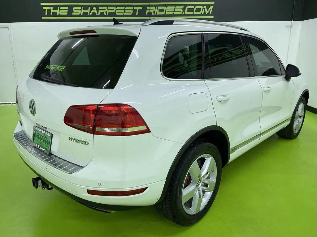 used 2012 Volkswagen Touareg Hybrid car, priced at $10,988