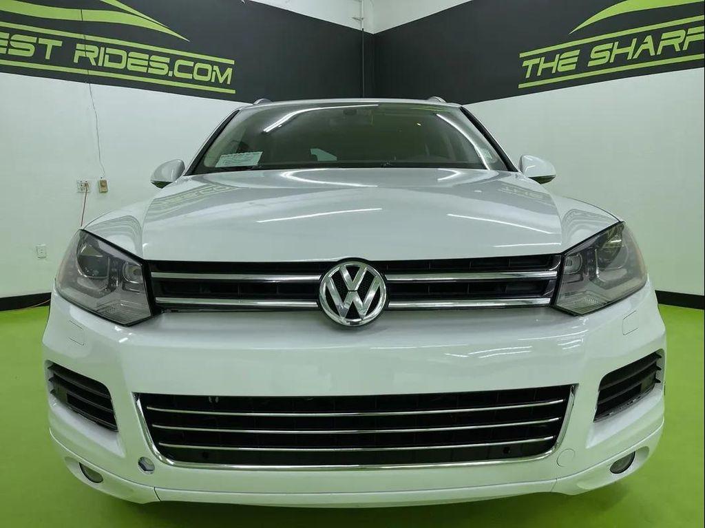 used 2012 Volkswagen Touareg Hybrid car, priced at $10,988