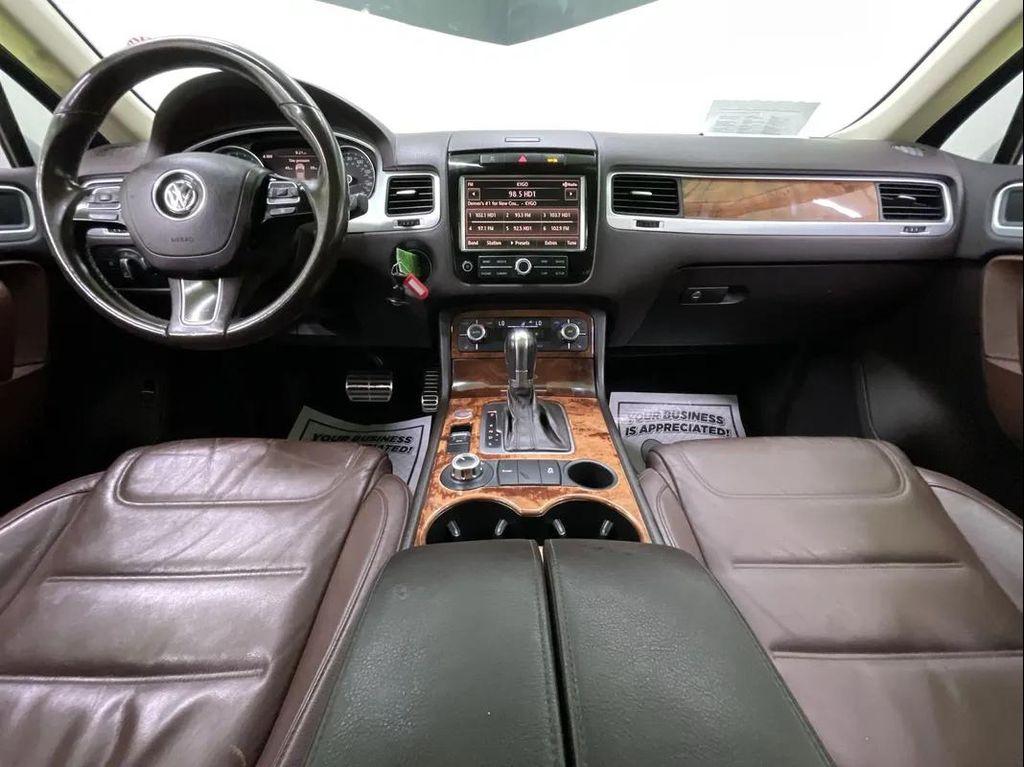 used 2012 Volkswagen Touareg Hybrid car, priced at $10,988
