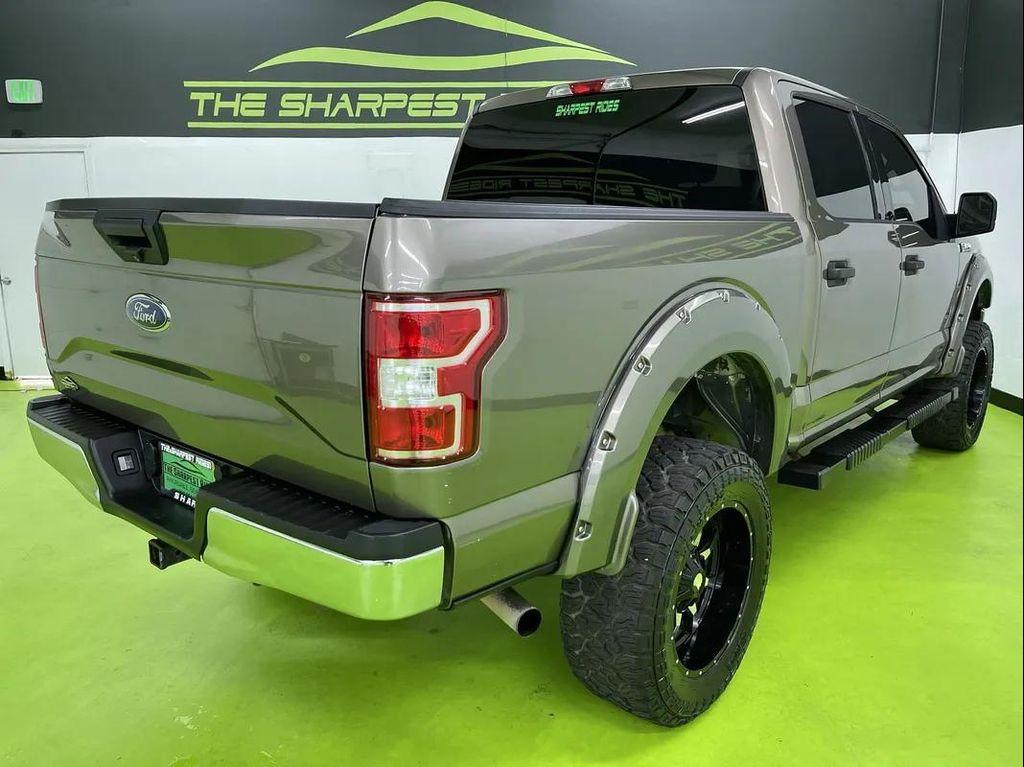 used 2018 Ford F-150 car, priced at $25,988