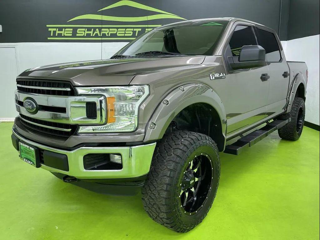 used 2018 Ford F-150 car, priced at $25,988