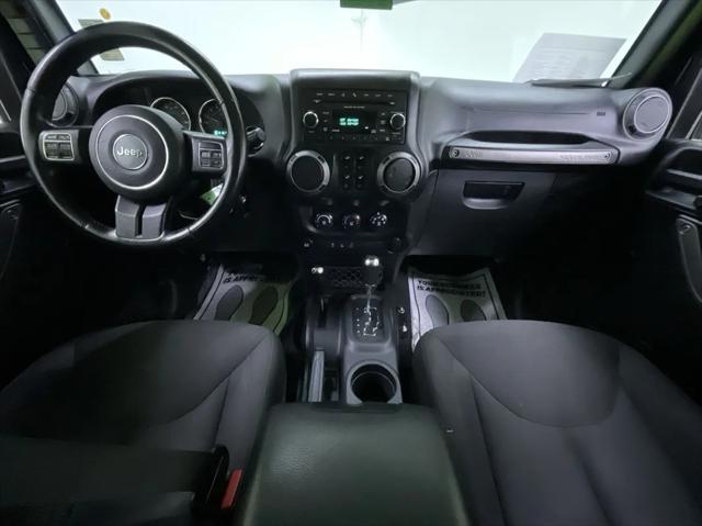 used 2015 Jeep Wrangler Unlimited car, priced at $15,988