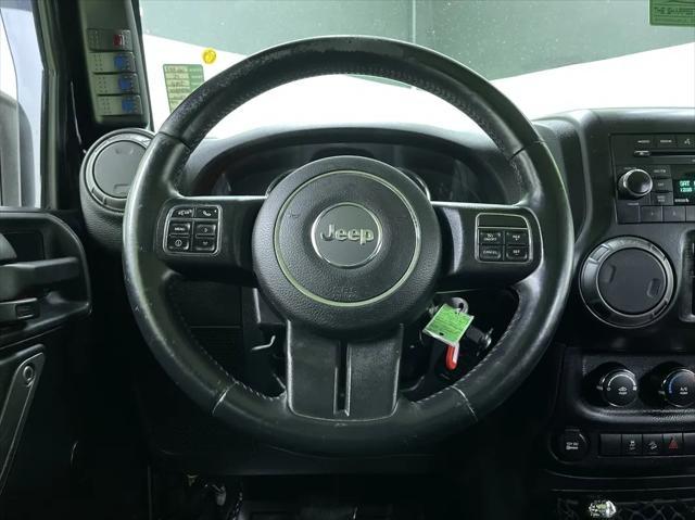 used 2015 Jeep Wrangler Unlimited car, priced at $15,988