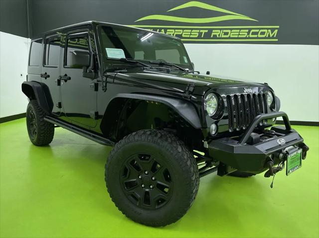 used 2015 Jeep Wrangler Unlimited car, priced at $15,988