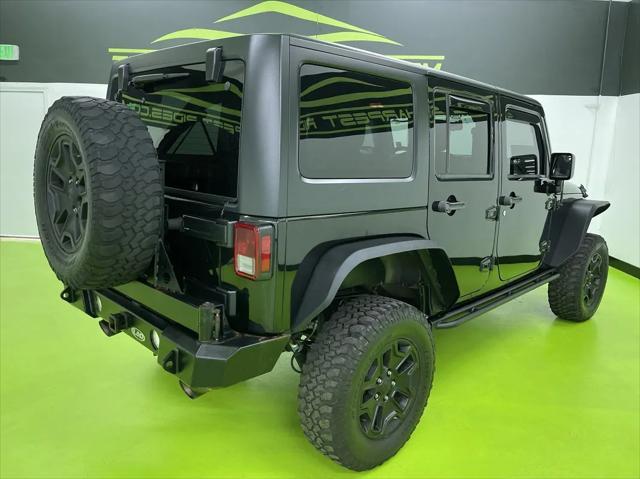 used 2015 Jeep Wrangler Unlimited car, priced at $15,988