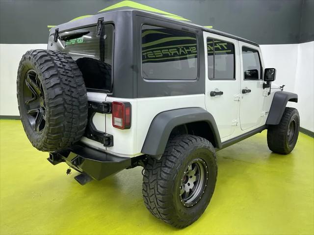 used 2013 Jeep Wrangler Unlimited car, priced at $18,988