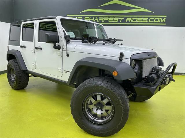 used 2013 Jeep Wrangler Unlimited car, priced at $18,988