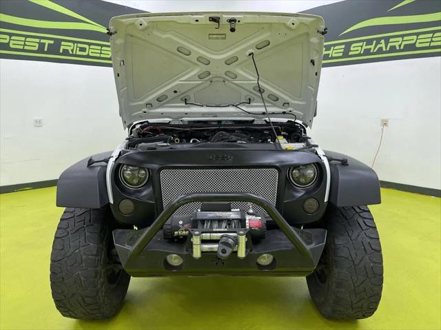 used 2013 Jeep Wrangler Unlimited car, priced at $18,988