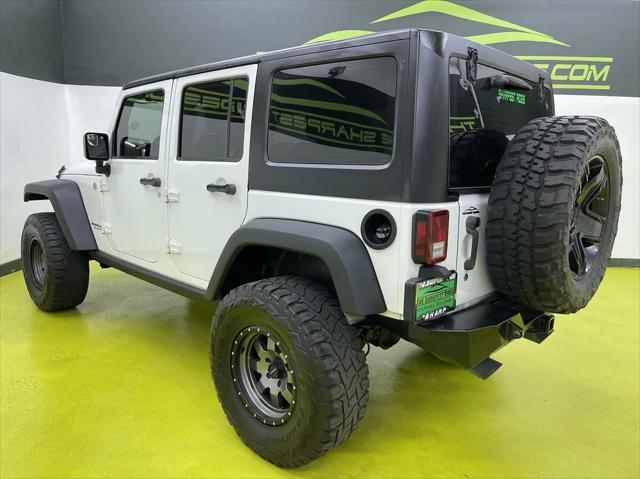 used 2013 Jeep Wrangler Unlimited car, priced at $18,988