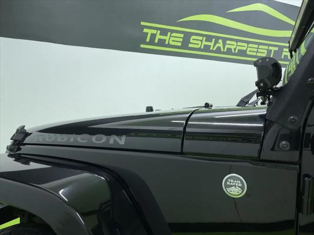 used 2015 Jeep Wrangler Unlimited car, priced at $21,988