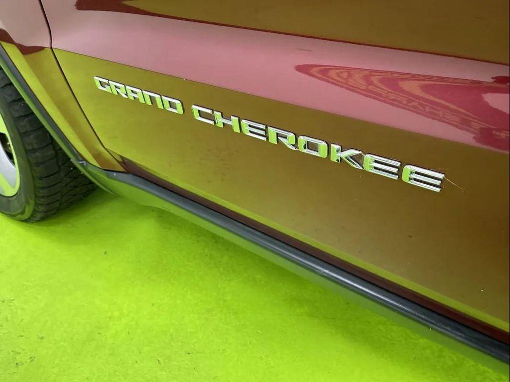 used 2014 Jeep Grand Cherokee car, priced at $12,488