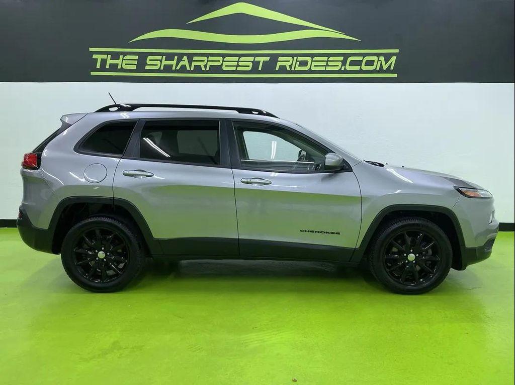 used 2014 Jeep Cherokee car, priced at $12,988