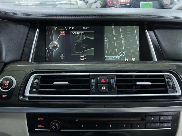 used 2014 BMW 750 car, priced at $13,988