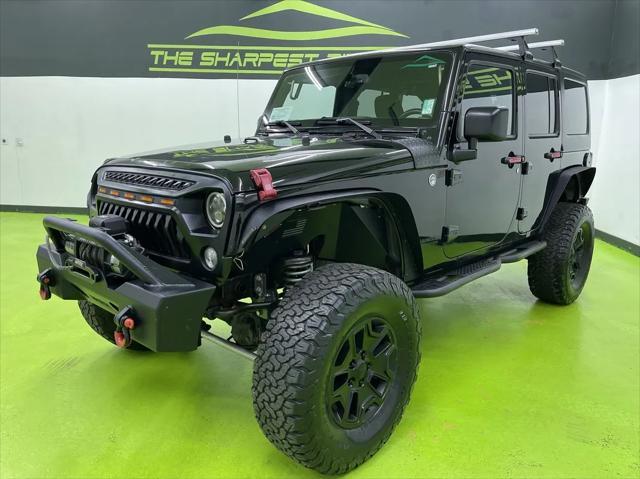 used 2015 Jeep Wrangler Unlimited car, priced at $18,988