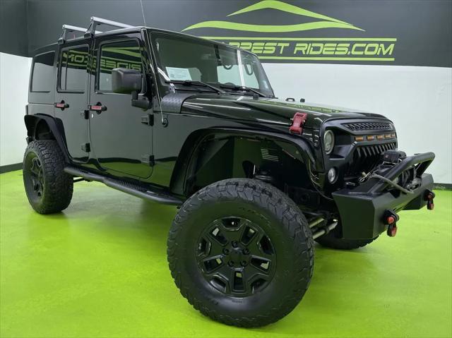 used 2015 Jeep Wrangler Unlimited car, priced at $18,988