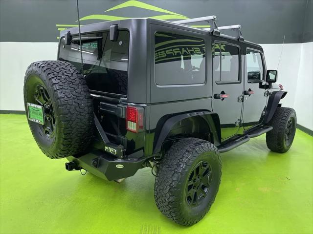 used 2015 Jeep Wrangler Unlimited car, priced at $18,988