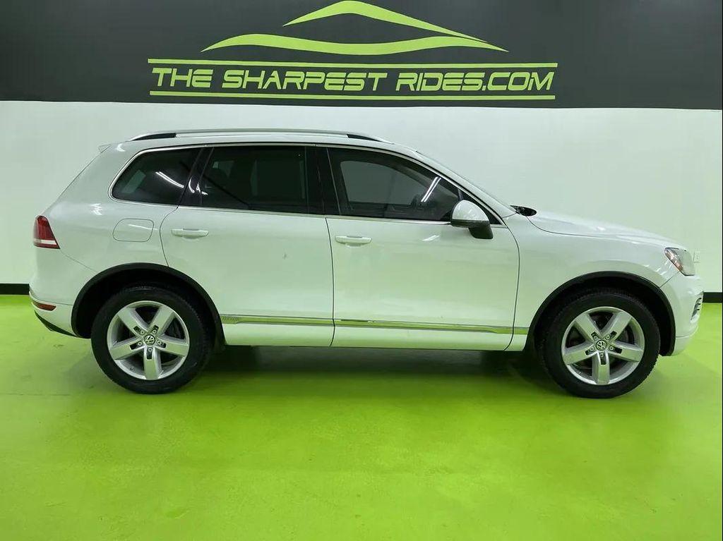 used 2012 Volkswagen Touareg Hybrid car, priced at $10,488