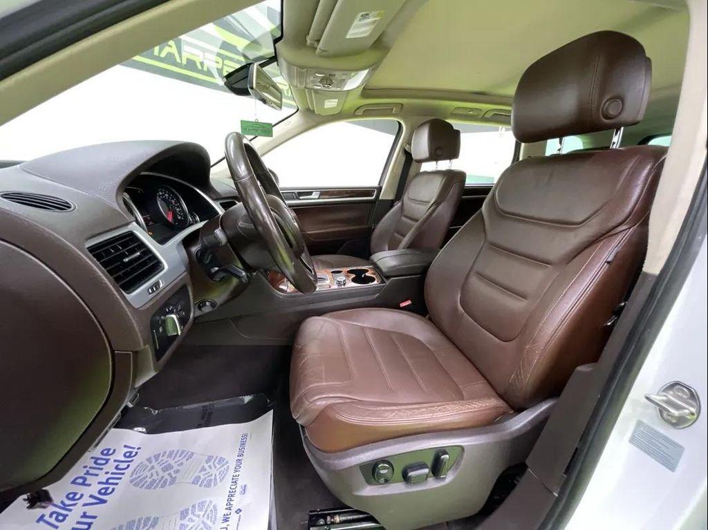used 2012 Volkswagen Touareg Hybrid car, priced at $10,488