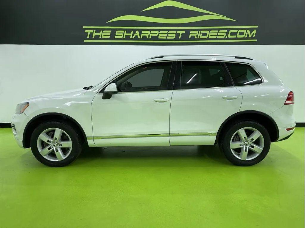 used 2012 Volkswagen Touareg Hybrid car, priced at $10,488