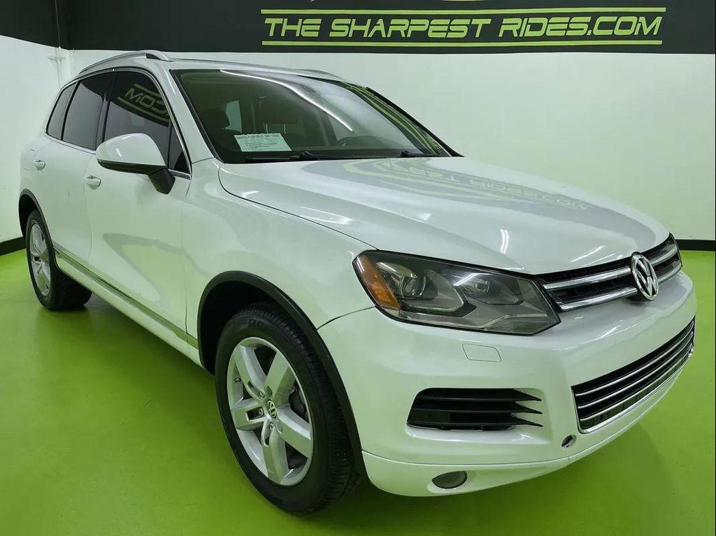 used 2012 Volkswagen Touareg Hybrid car, priced at $10,488