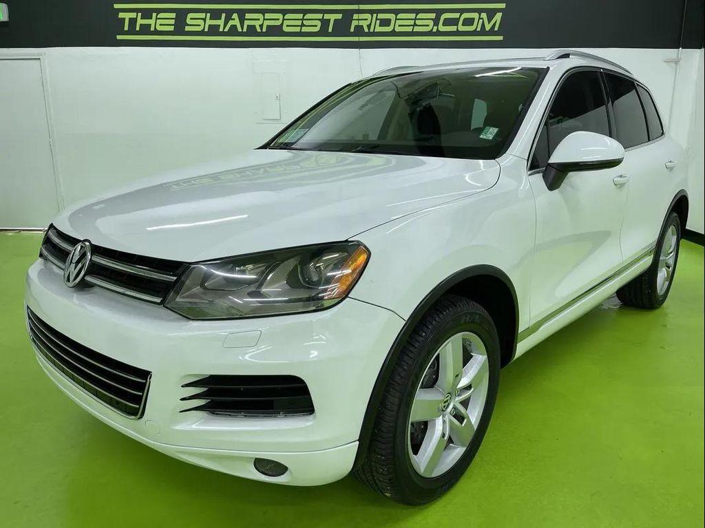 used 2012 Volkswagen Touareg Hybrid car, priced at $10,488