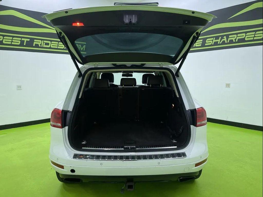 used 2012 Volkswagen Touareg Hybrid car, priced at $10,488