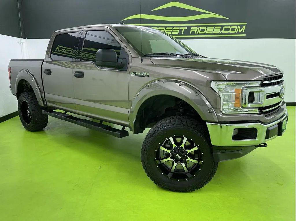 used 2018 Ford F-150 car, priced at $24,488