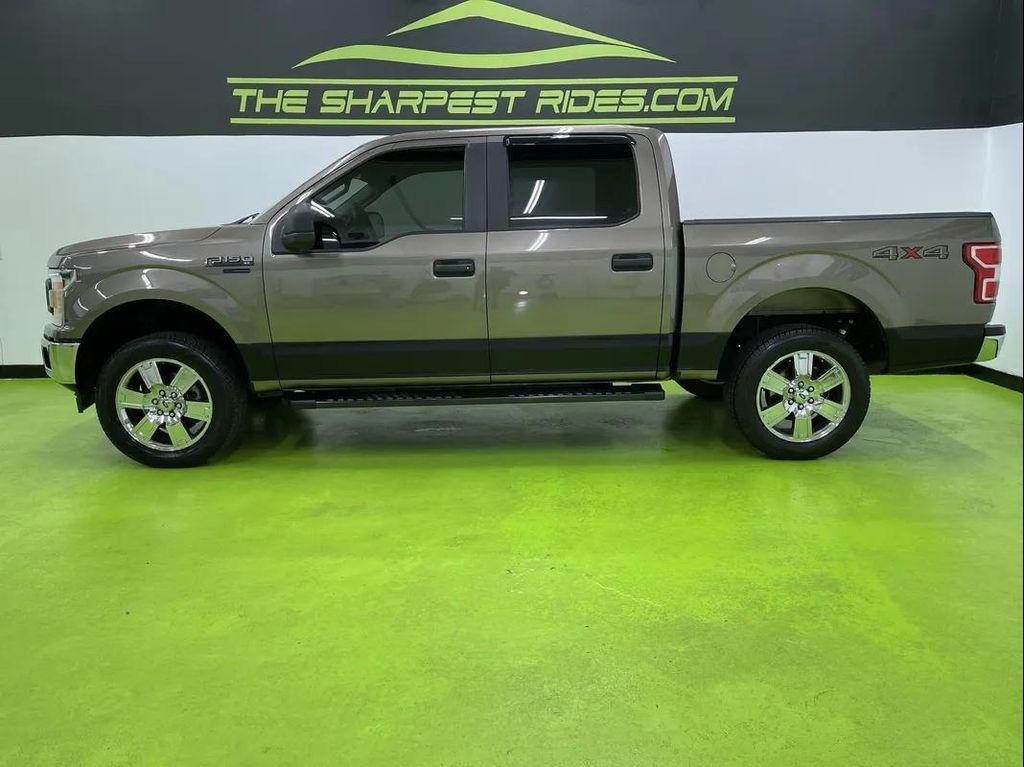 used 2018 Ford F-150 car, priced at $19,488