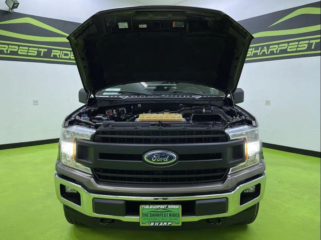 used 2018 Ford F-150 car, priced at $19,488