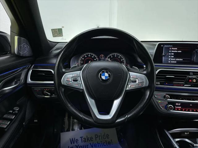 used 2016 BMW 750 car, priced at $24,988