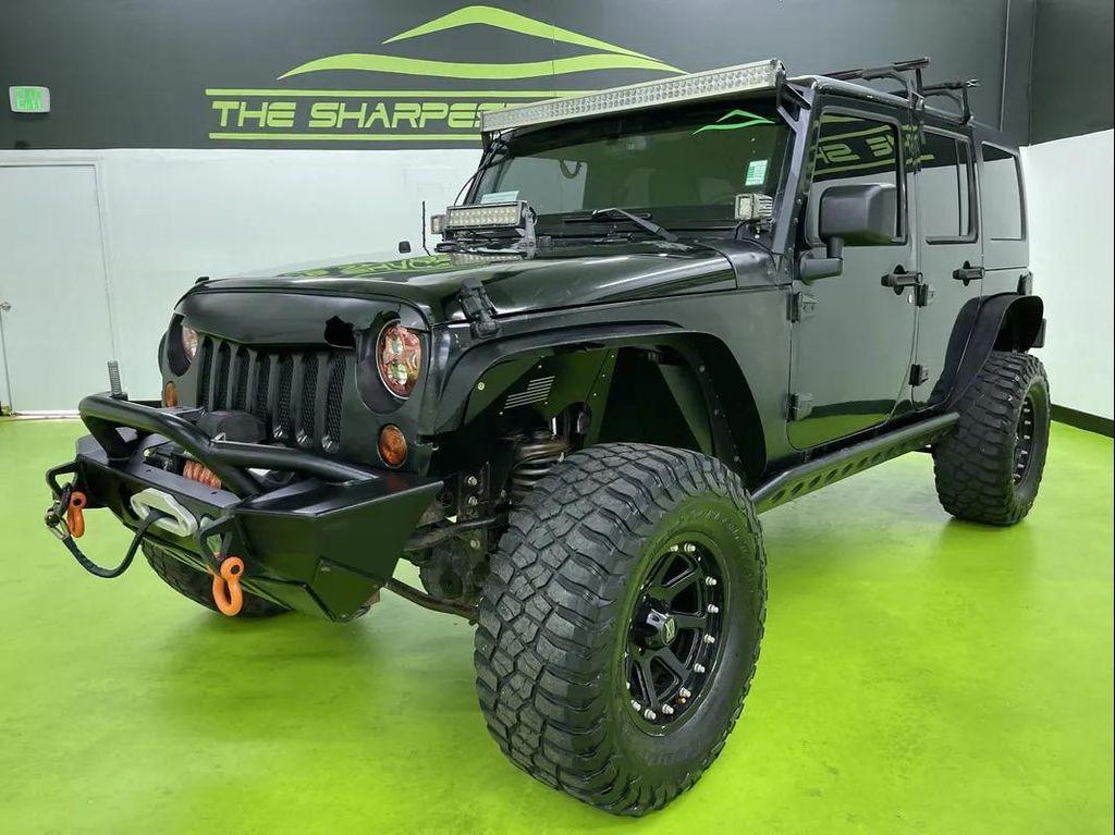 used 2013 Jeep Wrangler Unlimited car, priced at $14,488