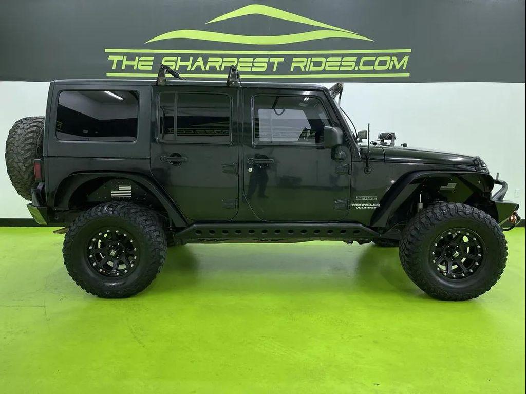used 2013 Jeep Wrangler Unlimited car, priced at $14,488