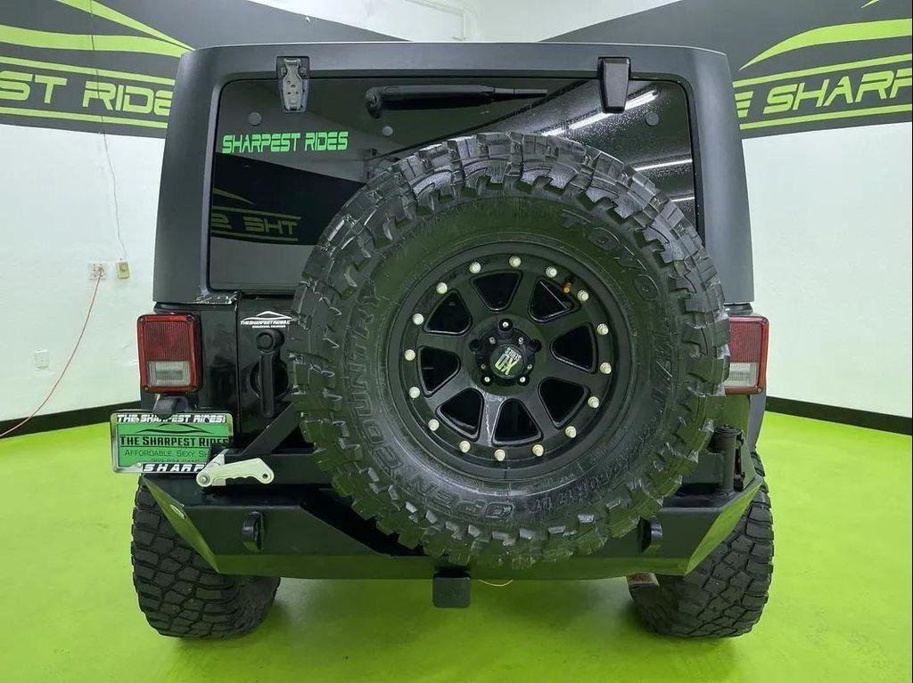 used 2013 Jeep Wrangler Unlimited car, priced at $14,488