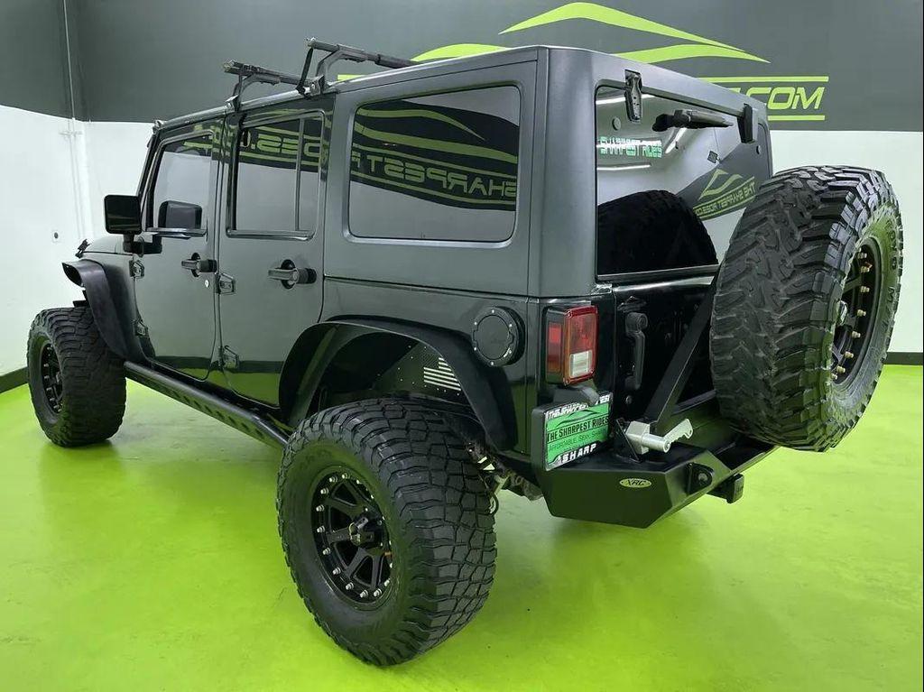 used 2013 Jeep Wrangler Unlimited car, priced at $14,488