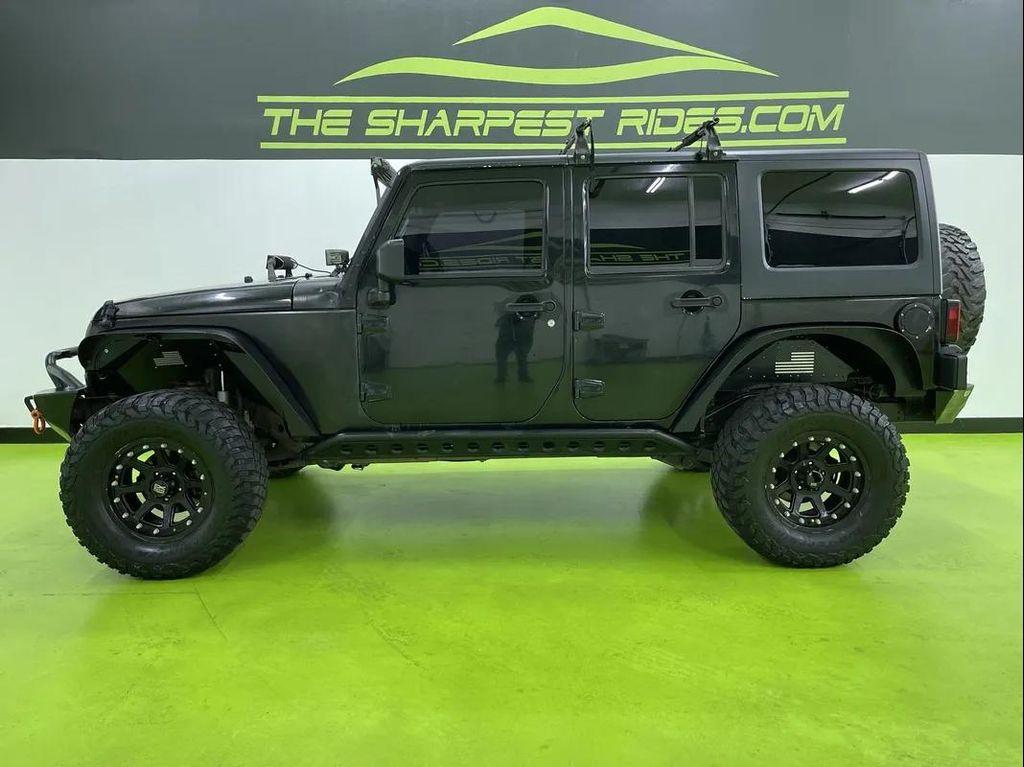 used 2013 Jeep Wrangler Unlimited car, priced at $14,488