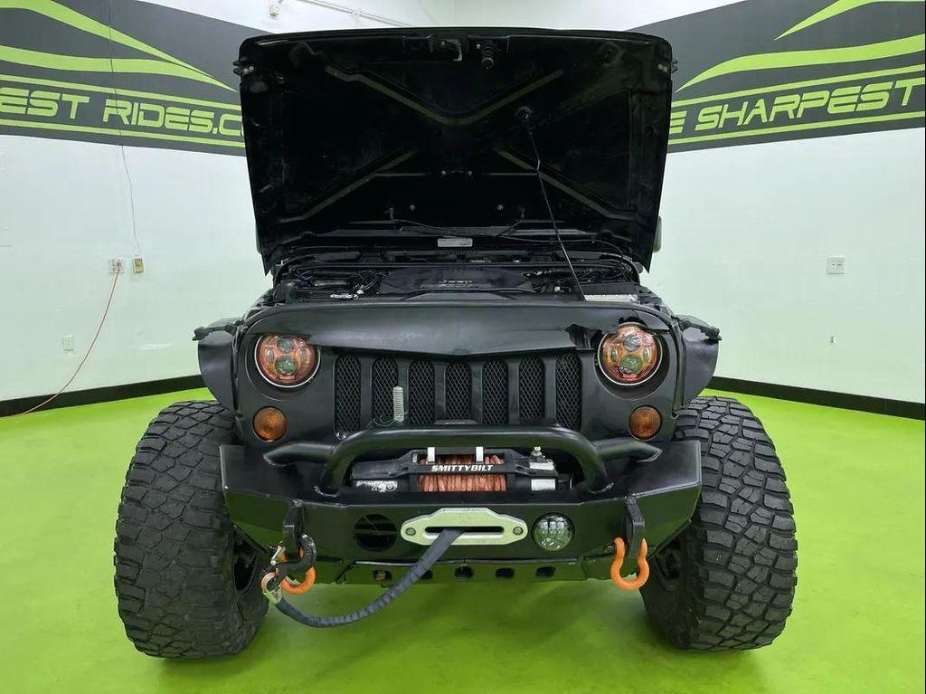 used 2013 Jeep Wrangler Unlimited car, priced at $14,488