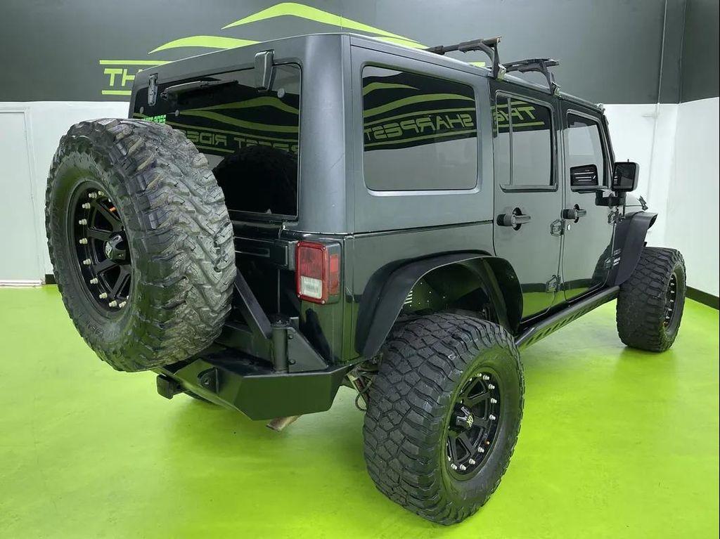 used 2013 Jeep Wrangler Unlimited car, priced at $14,488