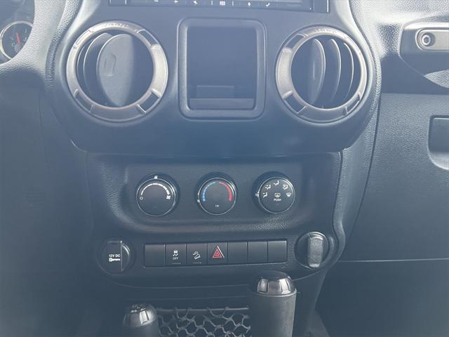 used 2015 Jeep Wrangler car, priced at $17,899
