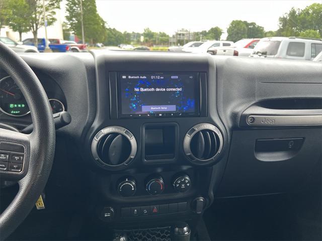 used 2015 Jeep Wrangler car, priced at $17,899