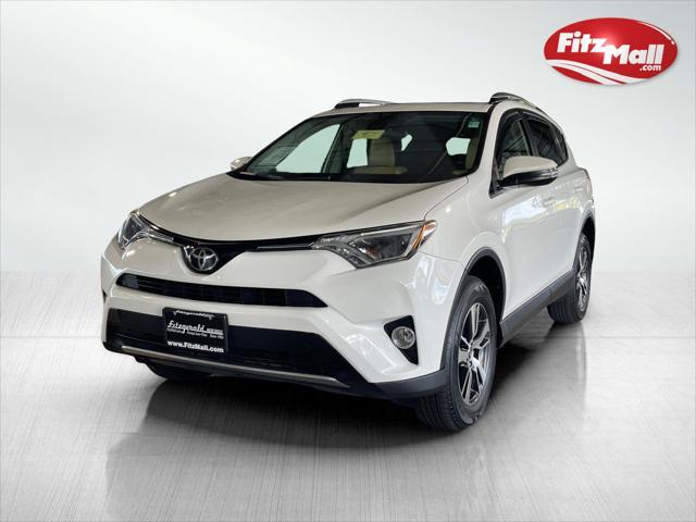 used 2018 Toyota RAV4 car, priced at $18,299