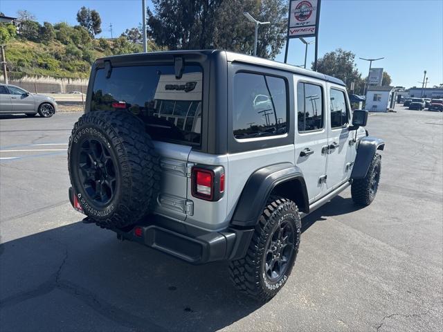 used 2023 Jeep Wrangler 4xe car, priced at $33,990
