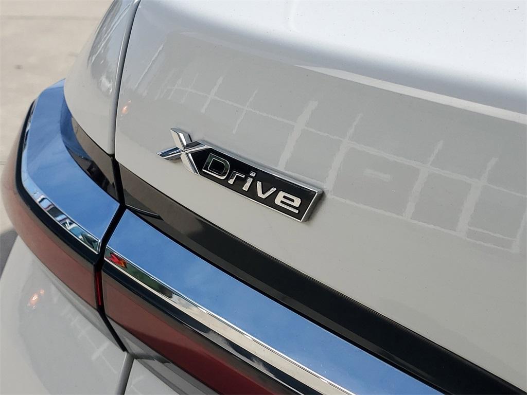 used 2024 BMW 740 car, priced at $61,791