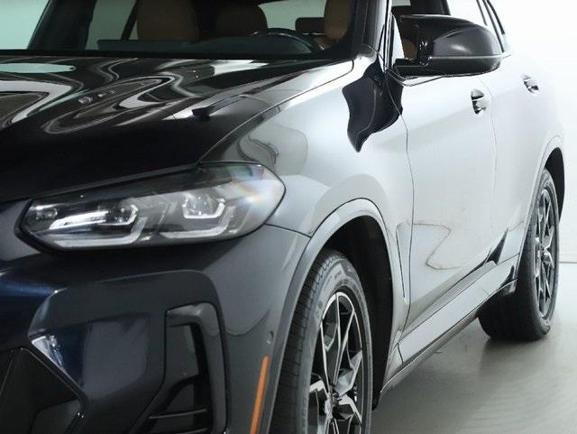 used 2023 BMW X4 car, priced at $53,857