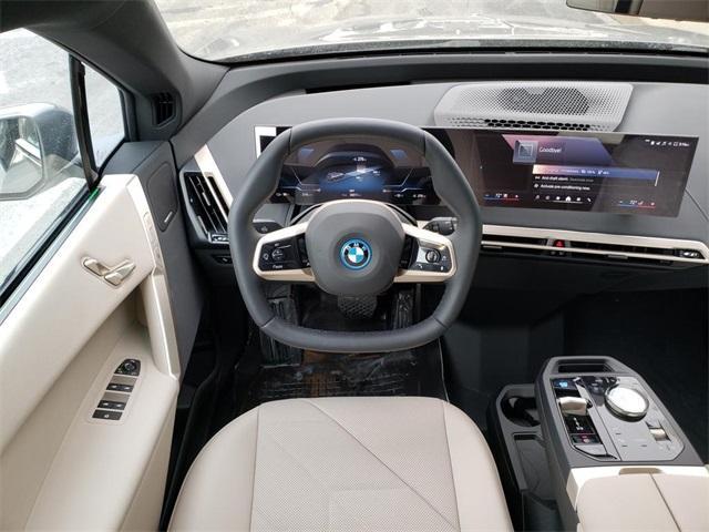 new 2025 BMW iX car, priced at $93,885