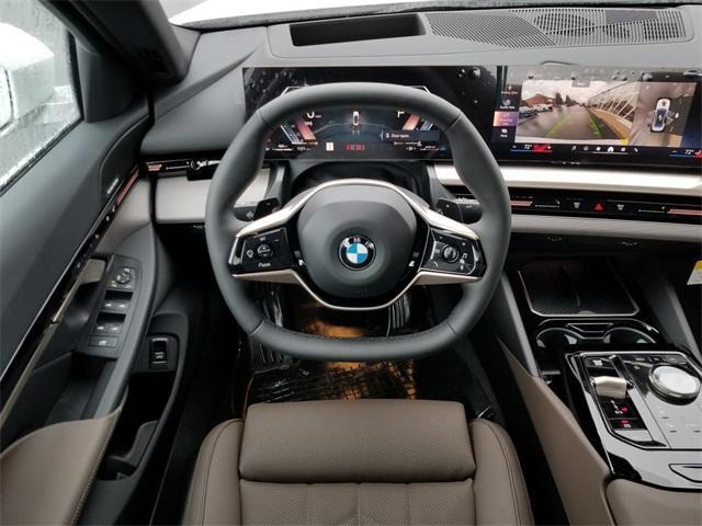 new 2025 BMW 530 car, priced at $67,205