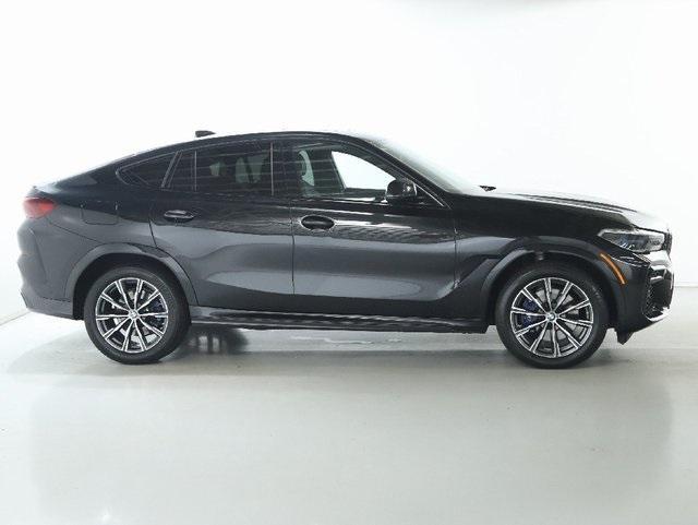 used 2023 BMW X6 car, priced at $54,817