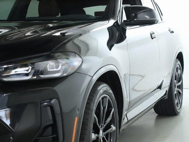 used 2023 BMW X4 car, priced at $55,020