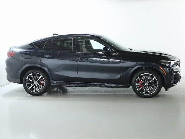 used 2023 BMW X6 car, priced at $54,287